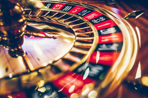 Live casino dealer table with blackjack cards and chips